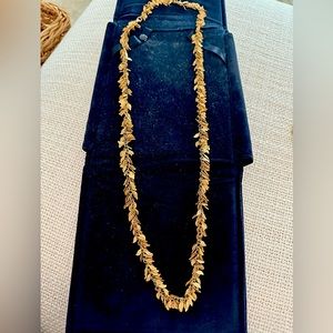 Soixante Neuf jewels gold leaf necklace.